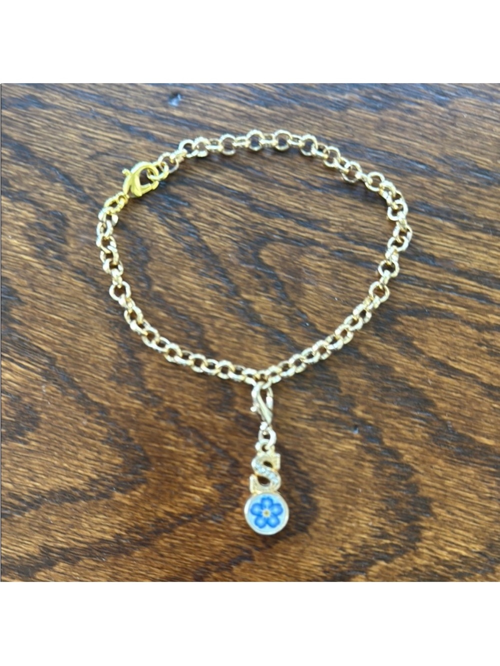 Gold Bracelet with Blue Flower S Charm
